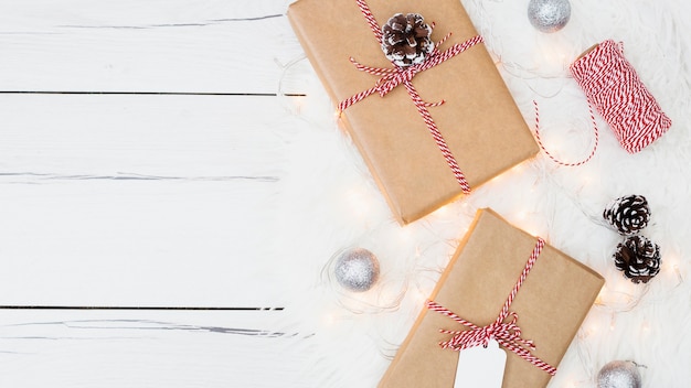 Christmas gifts with rope and pine cones