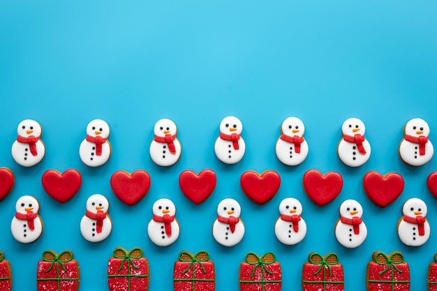 Christmas gingerbread on a blue background flat lay