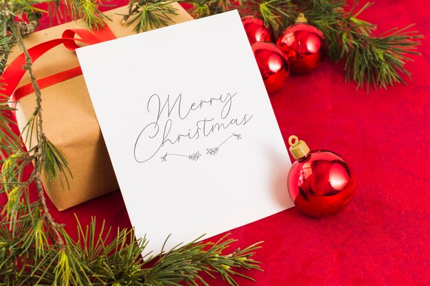 Christmas greeting card on table 