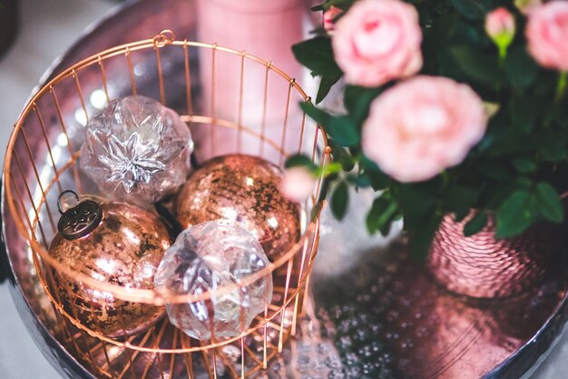 Christmas ornaments in a metal basket
