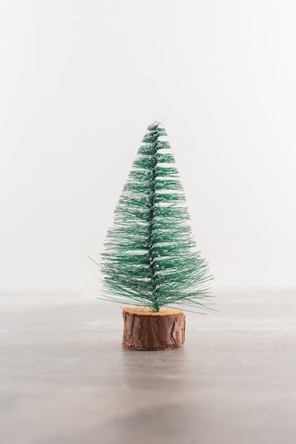 Christmas pine tree on wooden table.