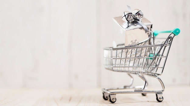 Christmas present in a shopping cart