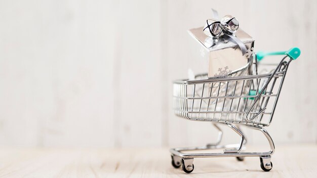 Christmas present in a shopping cart