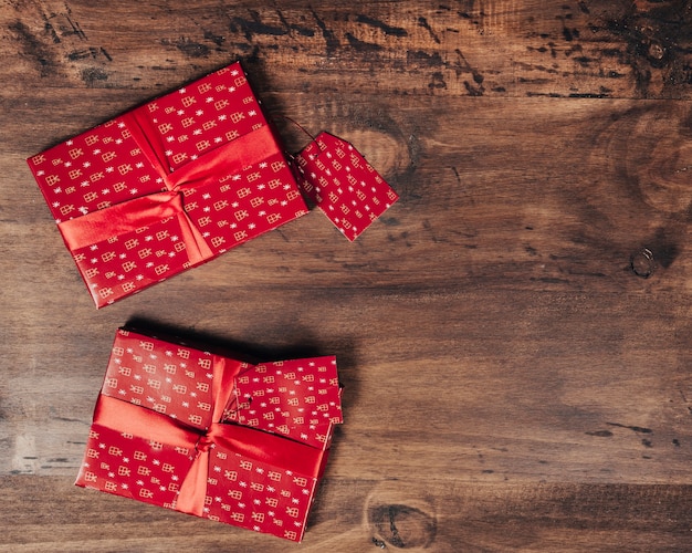 Christmas presents on wooden texture