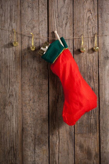 Christmas red sock hanging from a rope