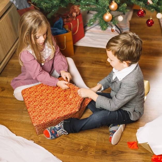 Christmas scene with boy and girl