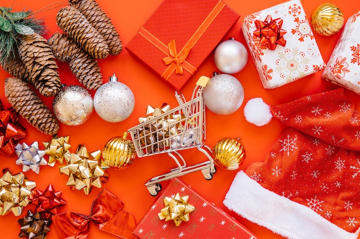 無料Photo 中にカートがあるクリスマスのショッピングコンセプト