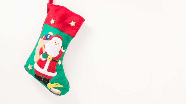Рождественский носок, висящий на стене