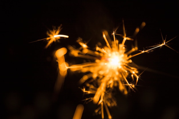 Free Photo | Christmas sparkler on dark background