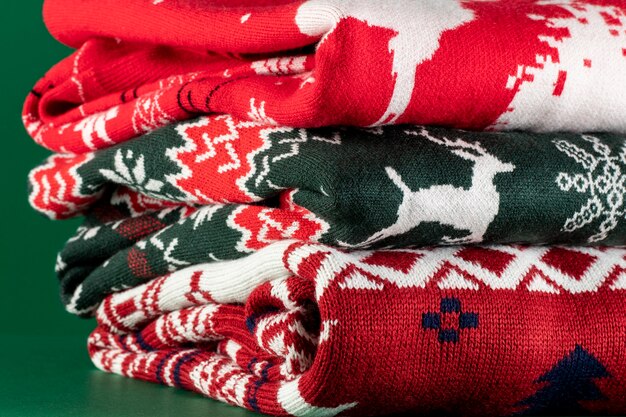 Christmas sweaters with green background