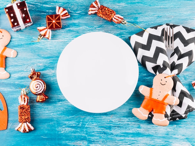 Christmas toys with plate on table