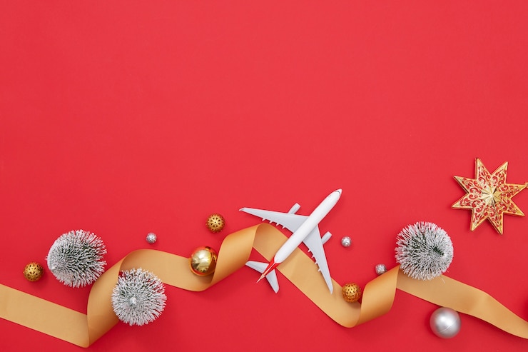 Free Photo christmas travel concept with airplane