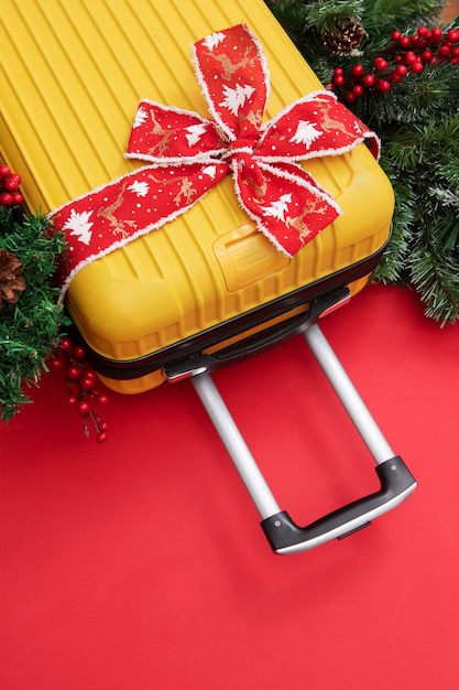 christmas travel concept with luggage
