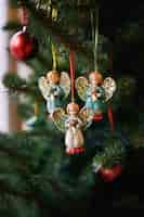 Free photo christmas tree angel ornaments