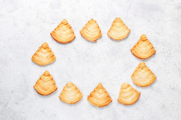 christmas tree shaped puff pastry cookies.