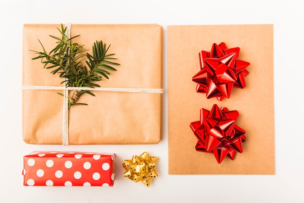 Christmas wrapped gifts with bows on white background