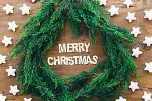 Free photo christmas wreath with letters in middle