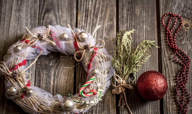 Christmas wreath on wooden background