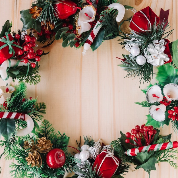 Christmas wreath on wooden table