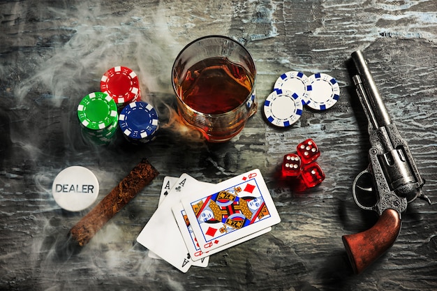 Free photo cigar, chips for gamblings, drink and playing cards