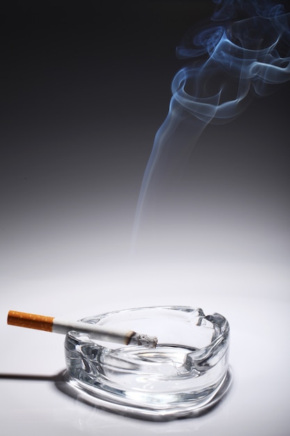 Cigarette in the ashtray
