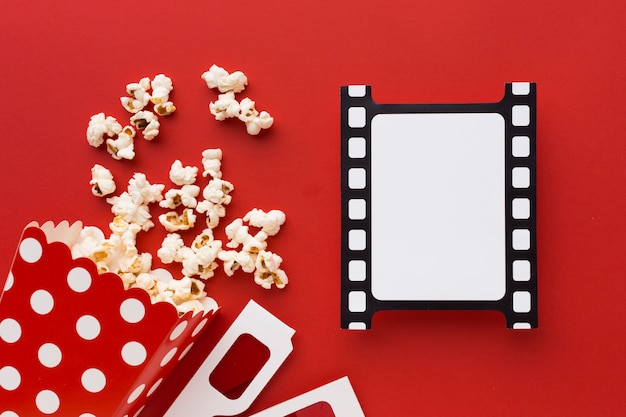 Cinema elements on red background