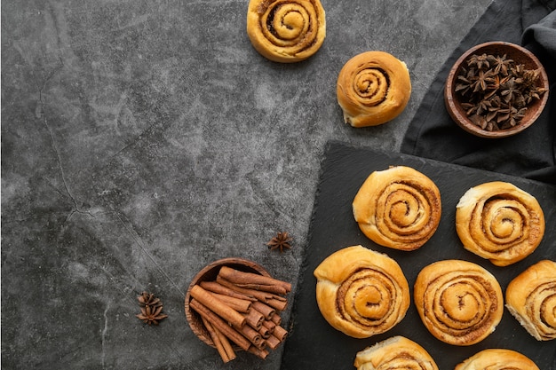 Free photo cinnamon rolls arrangement flat lay