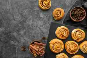 Free photo cinnamon rolls arrangement flat lay