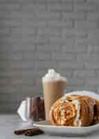 Free photo cinnamon rolls and beverage arrangement