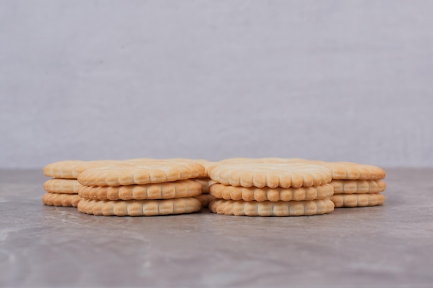 Circle tasty cookies on white table