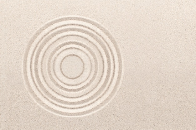 Free photo circle zen sand background in mindfulness concept