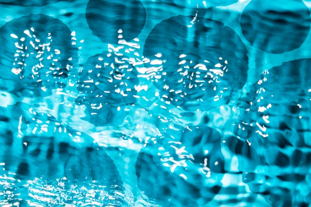 Circular drops of water on pool