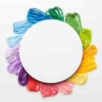 Free photo circular frame with colorful thread