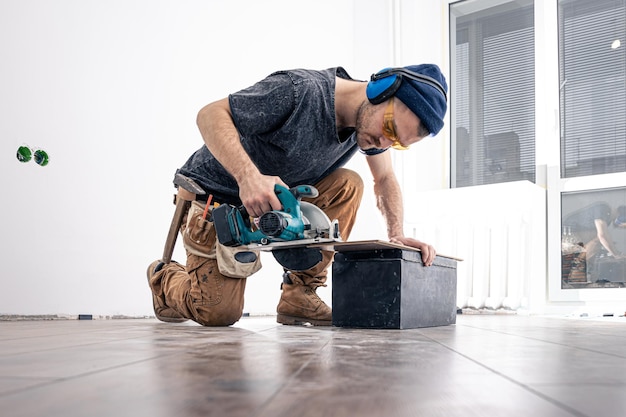 Circular saw carpenter using a circular saw for wood