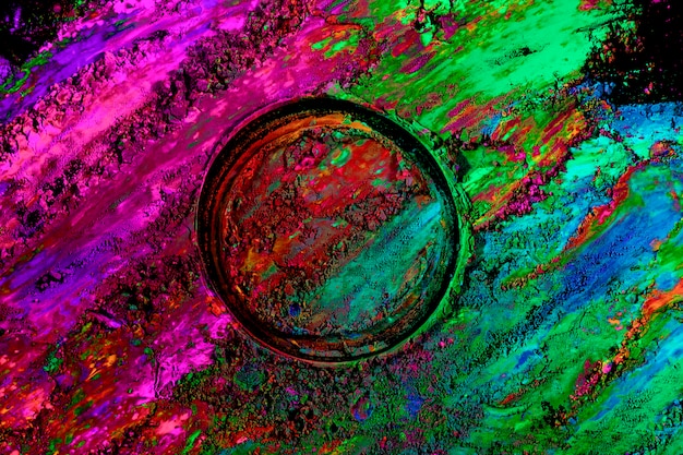 Circular shape made over center of multicolored holi powder