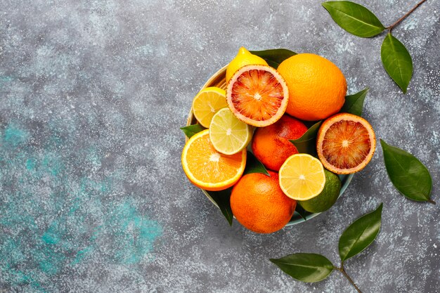 Citrus background with assorted fresh-citrus fruits