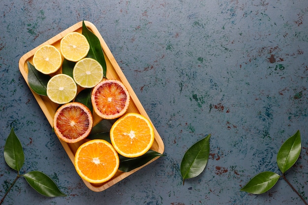 Citrus background with assorted fresh-citrus fruits