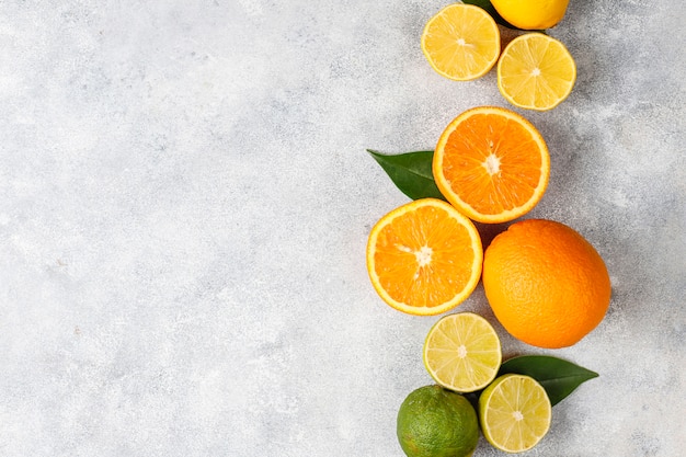 Citrus background with assorted fresh-citrus fruits