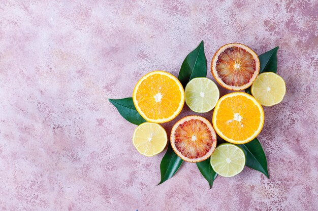 Citrus background with assorted fresh-citrus fruits