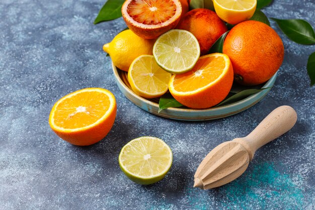 Citrus background with assorted fresh-citrus fruits