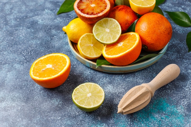 Citrus background with assorted fresh-citrus fruits