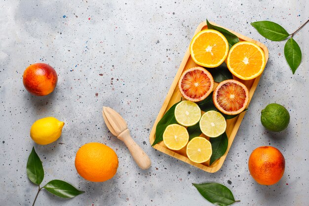 Citrus background with assorted fresh-citrus fruits