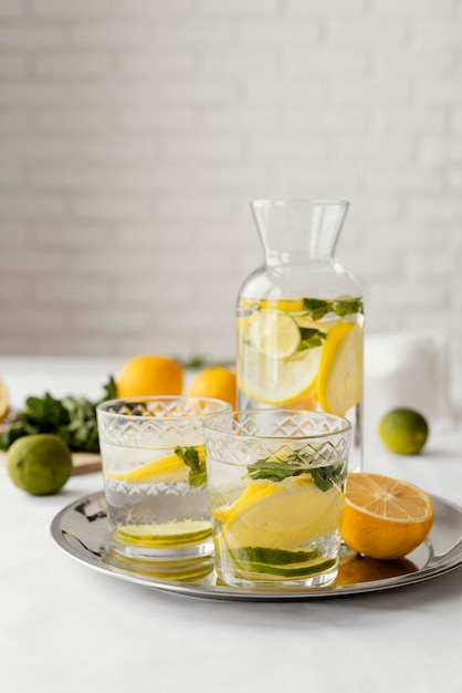 Free photo citrus drinks on tray arrangement