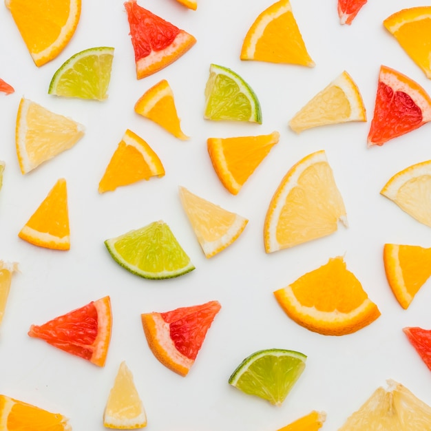 Citrus fruits slices isolated on white background