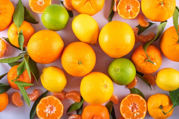 citrus fruits surface top view fresh citrus fruits with leaves