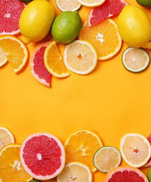 Citrus fruits top view, copyspace background