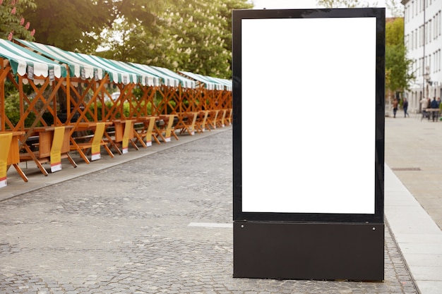 City format. vertical lightbox with white mock up space for your announcement Free Photo