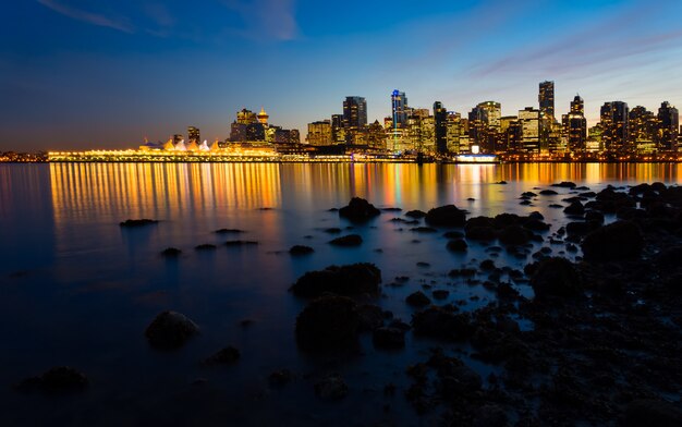 Cityscape Near Body Of Water