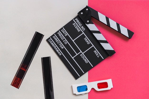 Free photo clapboard near carton 3d glasses