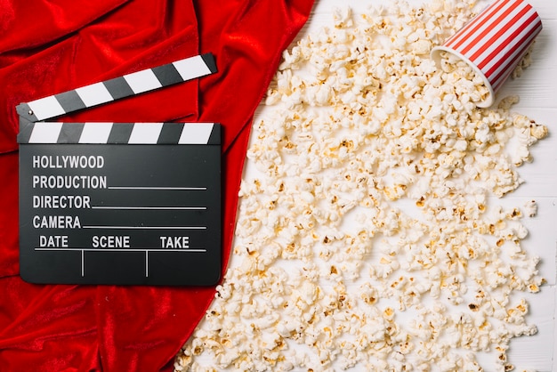 Clapperboard and popcorn